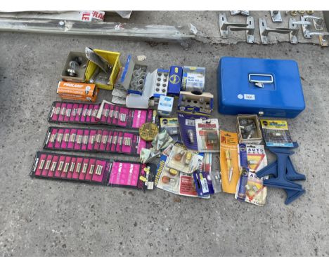 A LARGE ASSORTMENT OF HARDWARE TO INCLUDE LIGHT BULBS AND FUSES ETC 