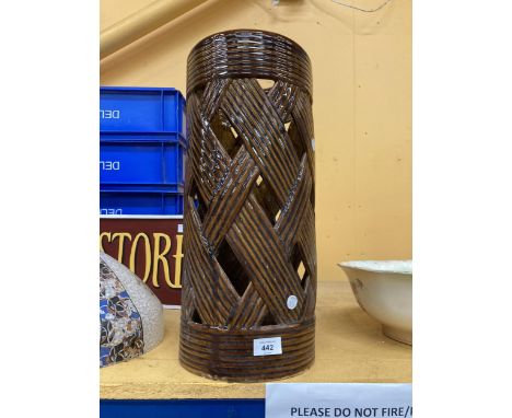 A POTTERY TREACLE GLAZED STICK/UMBRELLA STAND, HEIGHT 50CM 