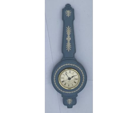 A WEDGWOOD PALE BLUE JASPERWARE CLOCK IN THE FORM OF A BAROMETER 
