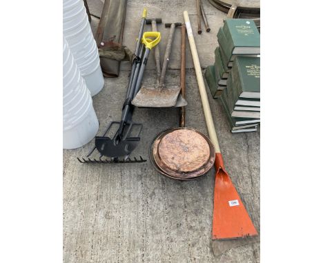 AN ASSORTMENT OF TOOLS TO INCLUDE SHOVELS, FORKS AND A COPPER BED PAN ETC 