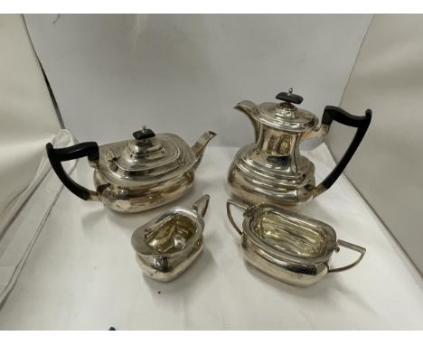 AN HALLMARKED SHEFFIELD WALKER AND HALL SILVER FOUR PIECE TEA SET WEIGHT 1864g