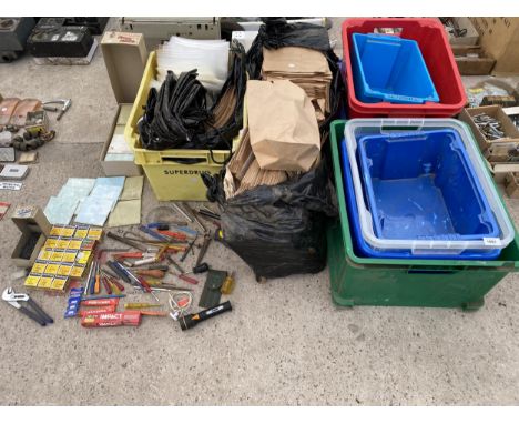 A LARGE ASSORTMENT OF ITEMS TO INCLUDE STORAGE BOXES, ENVELOPES AND TOOLS ETC 