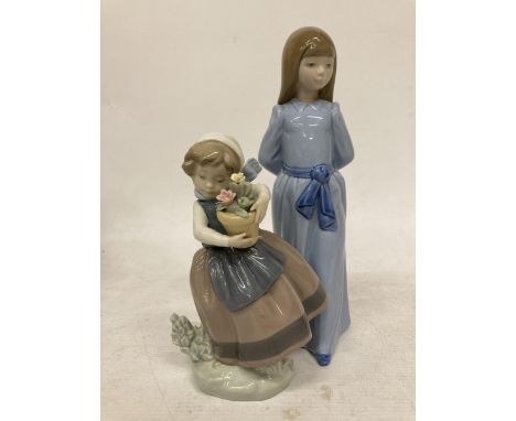 TWO FIGURES - LLADRO GIRL HOLDING FLOWERS AND A NAO GIRL IN A LONG BLUE DRESS 