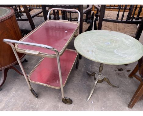 AN ONYX EFFECT TRIPOD TABLE AND A TWO TIER METALWARE TEA TROLLEY