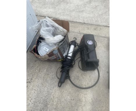 A BLOCK AND TACKLE, A WORK LIGHT AND A COMPRESSOR 