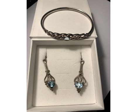 A SET OF SILVER EARRINGS AND BANGLE 