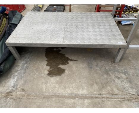 AN ALUMINIUM STEP WITH CHEQUER PLATE FLOOR 