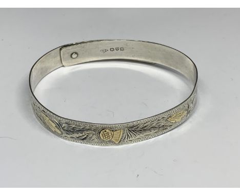 A SILVER BANGLE WITH CHESTER HALLMARK 