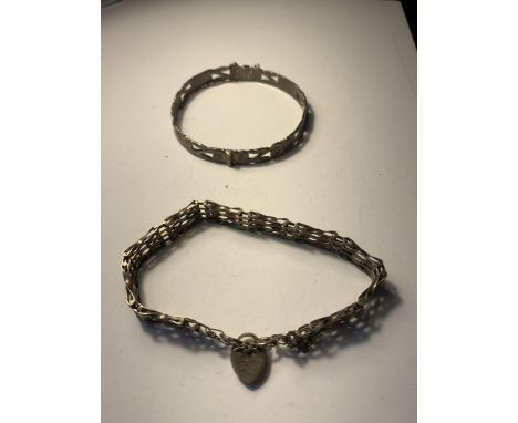 A SILVER BRACELET AND A SILVER BANGLE 