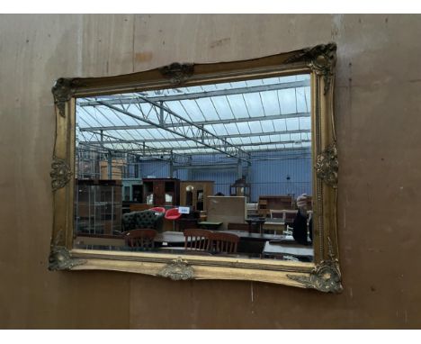 A GILT FRAMED BEVEL EDGE WALL MIRROR, 41 X 29" 