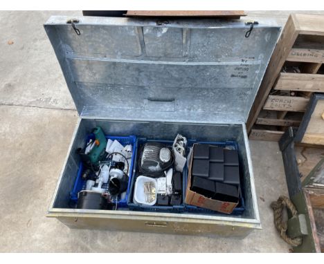 A LARGE GALVANISED STORAGE TRUNK AND A FOUR WHEELED WORKSHOP TROLLEY TO ALSO INCLUDE TOOLS AND HARDWARE ETC 