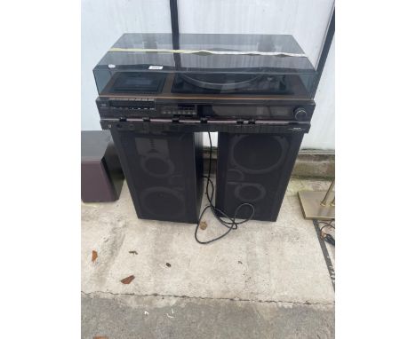 AN HITACHI STEREO MUSIC CENTRE AND A PAIR OF LARGE YAMAHA SPEAKERS 