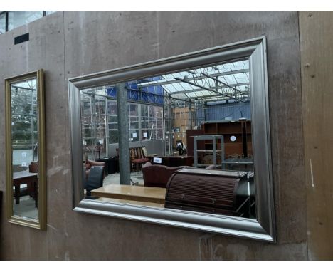 A MODERN SILVER GILT FRAMED WALL MIRROR, 41 X 29" 