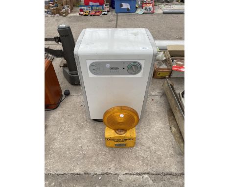 A DELONGHI DEHUMIDIFIER AND A ROAD LIGHT 