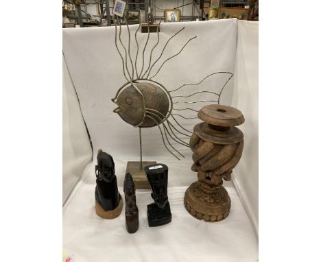 A COLLECTION OF CARVED TREEN ITEMS TO INCLUDE AFRICAN SSTYLE BUSTS, A LARGE POSSIBLE LAMP BASE AND A FISH SCULPTURE - 5 ITEMS