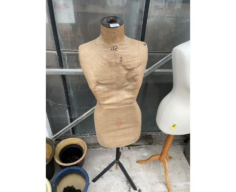 A VINTAGE DRESS MAKERS MANEQUIN WITH METAL TRIPOD STAND 