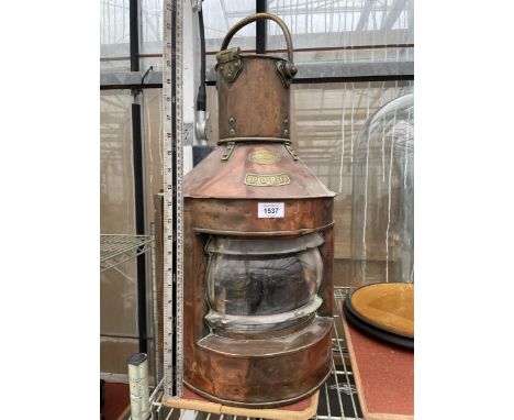 A LARGE VINTAGE COPPER 'PORT' LIGHT BEARING THE NAME W HARVIE 24 MCALPINES GLASGOW 