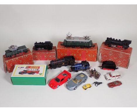 A part boxed Marklin HO gauge 3-rail 2-6-0 Locomotive and Tender, a boxed 3-rail 0-6-0 Tank Locomotive, a boxed 3-rail Bo-Bo 