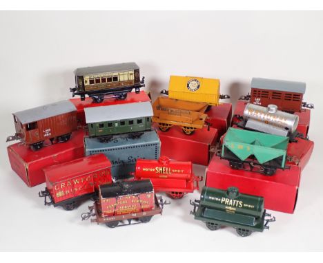 A boxed Hornby 0 gauge M1/2 Pullman Coach, boxed No.1 Rotary Tipping Wagon, boxed Hopper Wagon, boxed No.1 'National Benzole'
