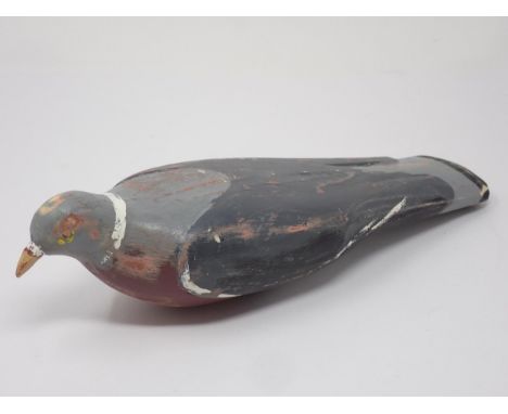 A vintage carved and painted Woodpigeon Decoy 13in L 