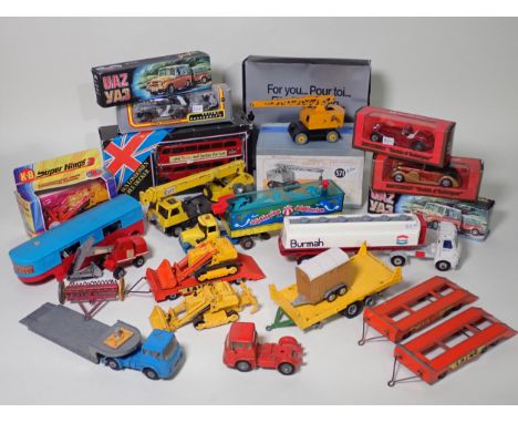 A box of boxed and unboxed diecast Vehicles including Dinky Toys No.571 Mobile Crane, Matchbox Caterpillar, Solido London dou