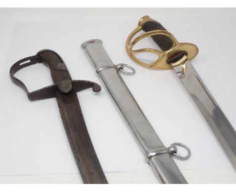 An antique, possibly 18th Century Cavalry type Sabre with wooden grip and a 20th Century Dress Sword in steel Scabbard 