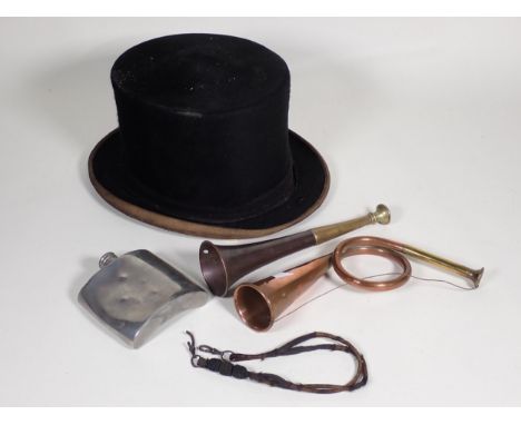 A black felt Hunting Top Hat, brass and copper Hunting Horn, copper Hunting Horn and a Hip Flask once having belonged to M.P.