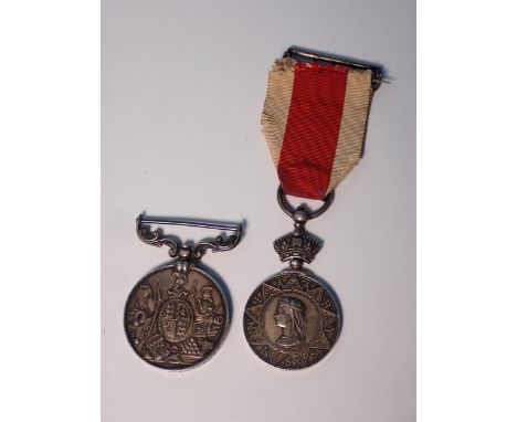 A pair of Medals comprising the Abyssinia Medal to 452 R. Youngman 25th Brigade Royal Artillery and a Long Service and Good C