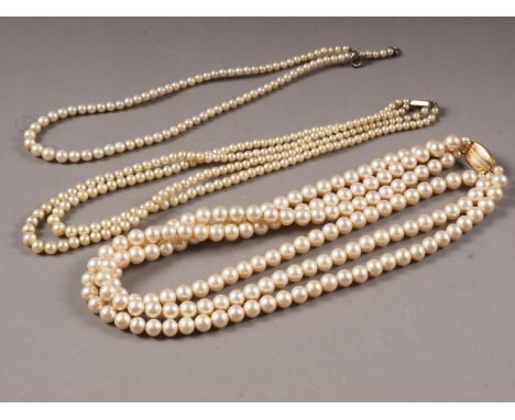 A Ciro three-strand pearl necklace with 9ct gold clasp, a similar Ciro two-strand pearl necklace with 9ct gold clasp, and a s