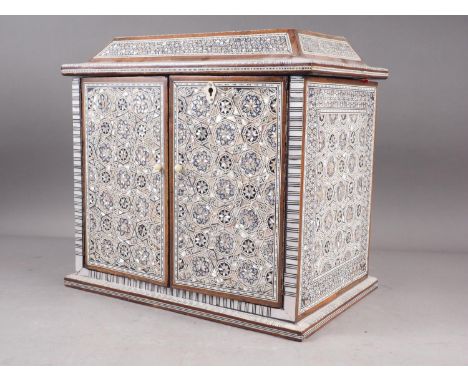 A mahogany and mother-of-pearl inlaid jewellery cabinet, 13" high 