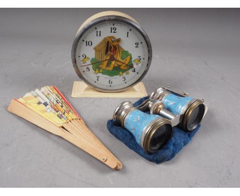 A Bayard "Pluto" Disney alarm clock, a pair of opera glasses and a fan 