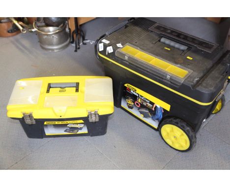 A Stanley Pro Mobile tool chest, a Stanley 19" toolbox and a number of hand tools 