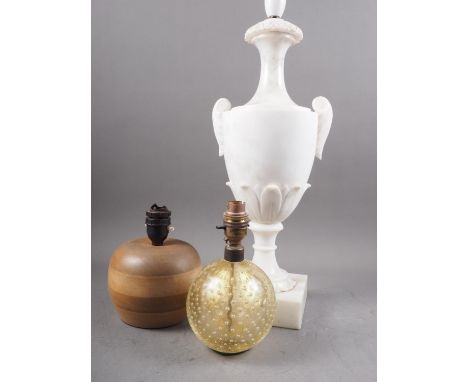 A white marble urn-shaped table lamp, on square base, 20" high overall, a turned hardwood table lamp and anotherCondition:The
