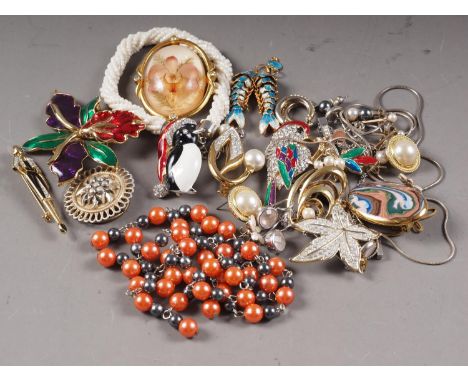 A quantity of costume jewellery, including a Chinese gilt metal and enamel double articulated fish pendant, a simulated pearl