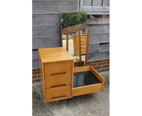 A 1950s light oak dressing table, fitted three drawers and full length mirror, 34" wide x 18" deep x 64" high 