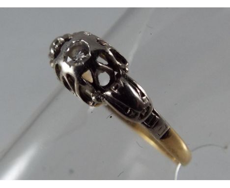 A lady's 18 carat yellow gold and platinum solitaire ring set with 5 pt diamond, approx 1.80 gm (all in), size M + ½ - Est £6