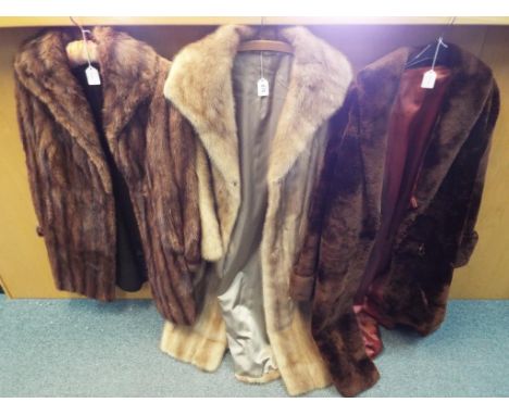 Three lady's fur coats, unmarked for size, the first approximately 88 cm length, the second approximately 110 cm and a third 