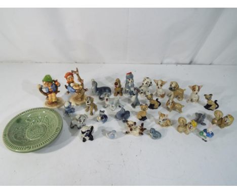 Wade - a lot to include a quantity of Wade and similar figurines to include Whimsies, Whoppers, Disney characters, also inclu