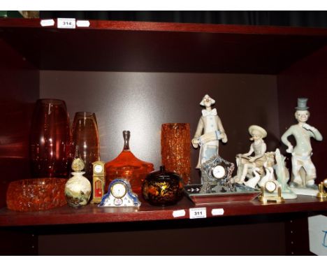 A good mixed lot of glassware, ceramics, miniature clocks, to include MTARFA glass perfume bottle, Nao figurines and similar,