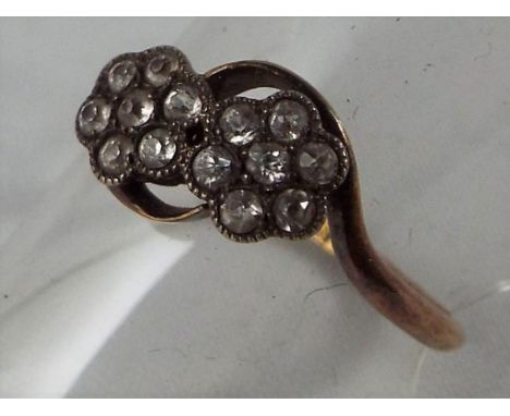 An 18ct gold and diamond ring, size L½, approx weight 2.03grams Est £40 - £60
