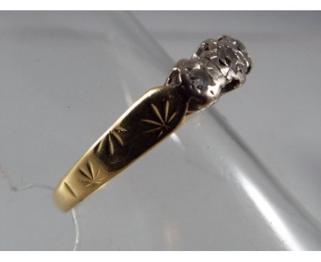 A lady's hallmarked 18 carat yellow gold three stone diamond ring set with total of 15 pts of diamonds, approx 2.87 gm (all i