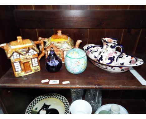 Two Price Kensington novelty tea pots, a Caithness Saracen paperweight, a Shelley lidded preserve pot decorated in the Melody