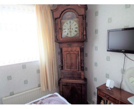 A long case clock by Thomas Milner of Wigan, the mahogany case with walnut banding, swan neck pediment to the arched hood, ei