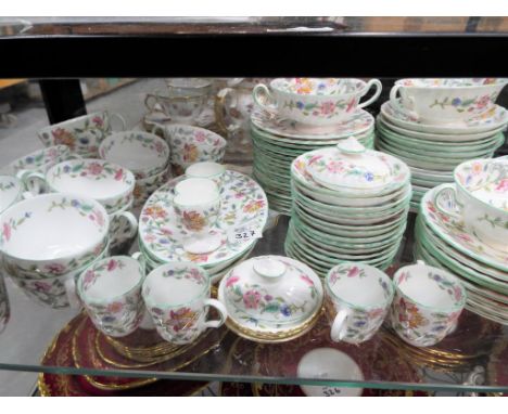 Minton - approximately 115 pieces of Minton tea and dinner ware in a Haddon HAll pattern, comprising plates, cups, saucers, s