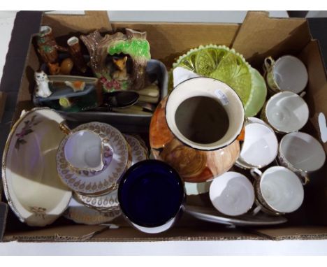 A good mixed lot of glassware, ceramics and flatware to include two part table services by Royal Vale, a Royal Blue Ironstone