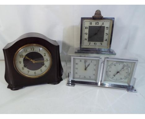 A Smiths Bakelite cased mantel clock, Arabic numerals to a silvered chapter ring, movements marked Smiths Enfield, also inclu