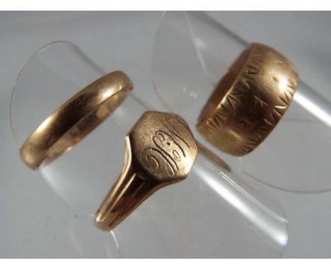 9 carat gold - two 9 ct gold wedding bands and a 9 carat gold signet ring, all stamped 375, approximate weight 7.75 g, Est £7