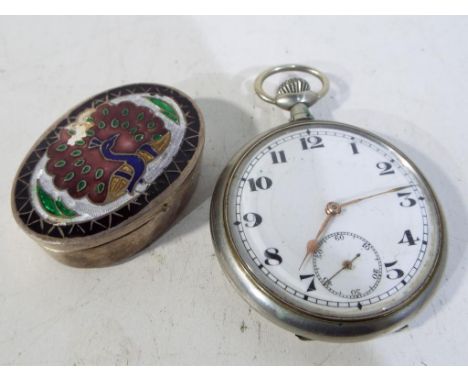 A white metal pocket watch with white enamelled dial, Arabic numerals with subsidiary second dial and Eastern white metal ena