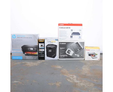 Five various computer accessories including a Cannon fax machine, HP printer, Cannon scanner, kodak easy share and a Fellows 