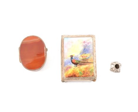 A nickel book match holder, enamel scenic panel of a pheasant to cover, scroll border, engraved back, 6cm x 4.5cm; a metal an